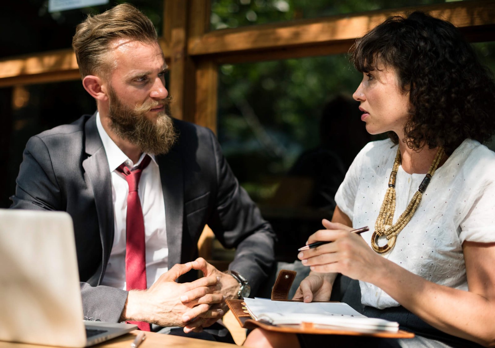 In-office real estate brokerage assessment with Ken Goodfellow, reviewing profit and loss statements, organizational structure, and business systems to identify operational and profitability improvements.